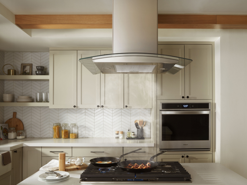 A canopy hood in a modern kitchen. A canopy hood in a modern kitchen.